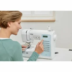 BROTHER - Machine à coudre électronique 40 points - enfile-aiguille - ecran lcd - touches de sélection - bras libre