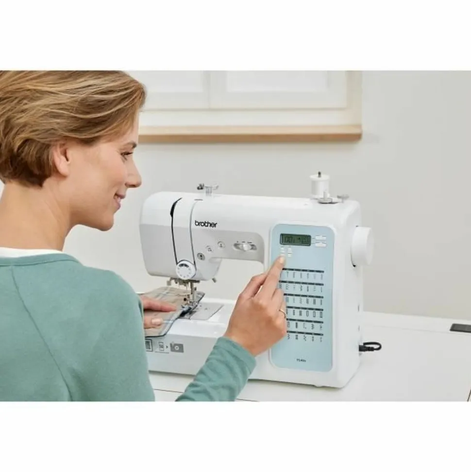 BROTHER - Machine à coudre électronique 40 points - enfile-aiguille - ecran lcd - touches de sélection - bras libre