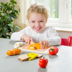 NEW CLASSIC TOYS - Planche d'aliments en bois à découper